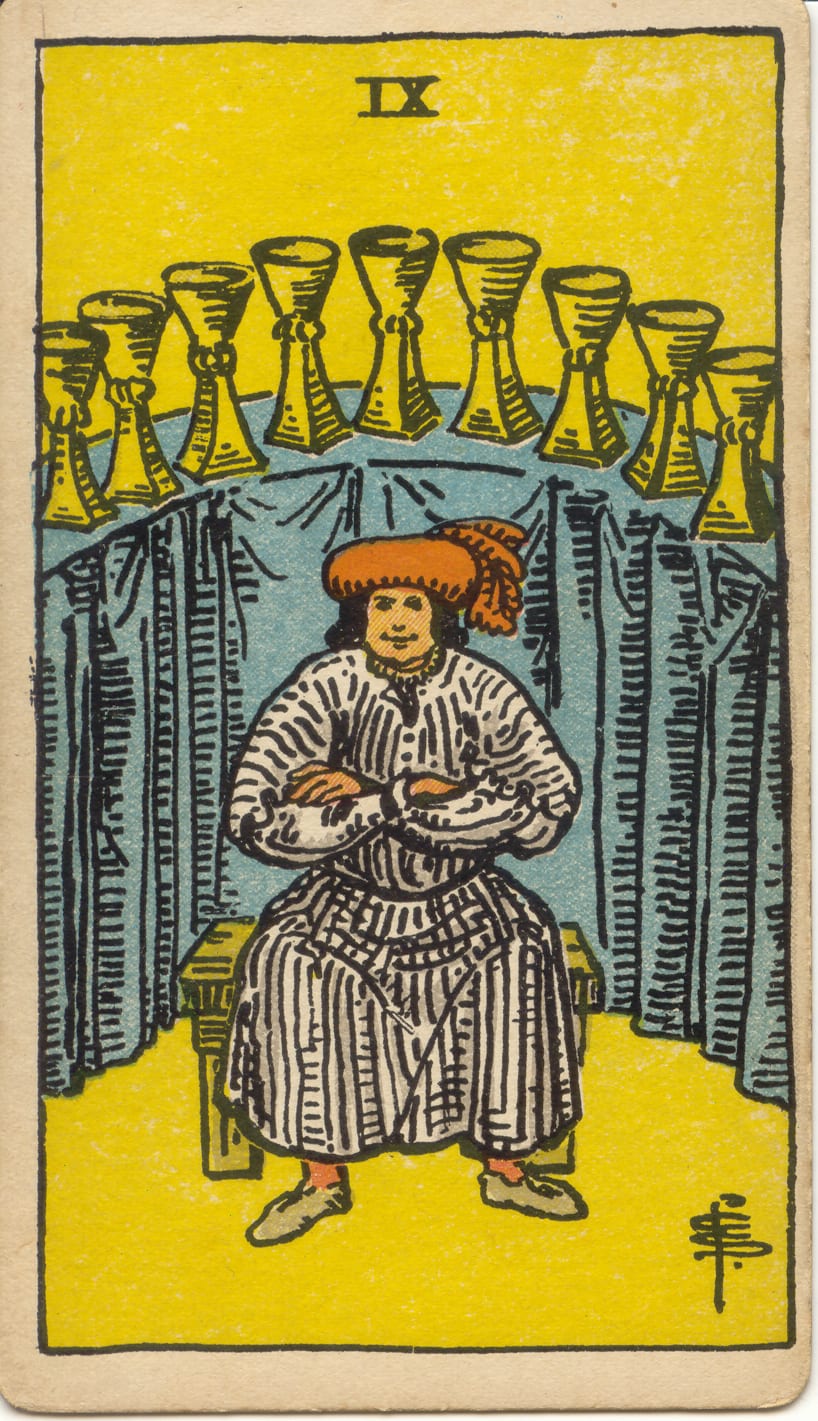 Kupaların Dokuzlusu Rider–Waite–Smith tarot kartı